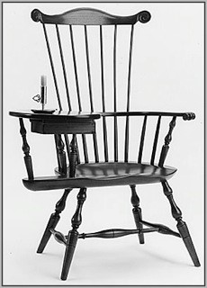 Comb-back writing arm chair